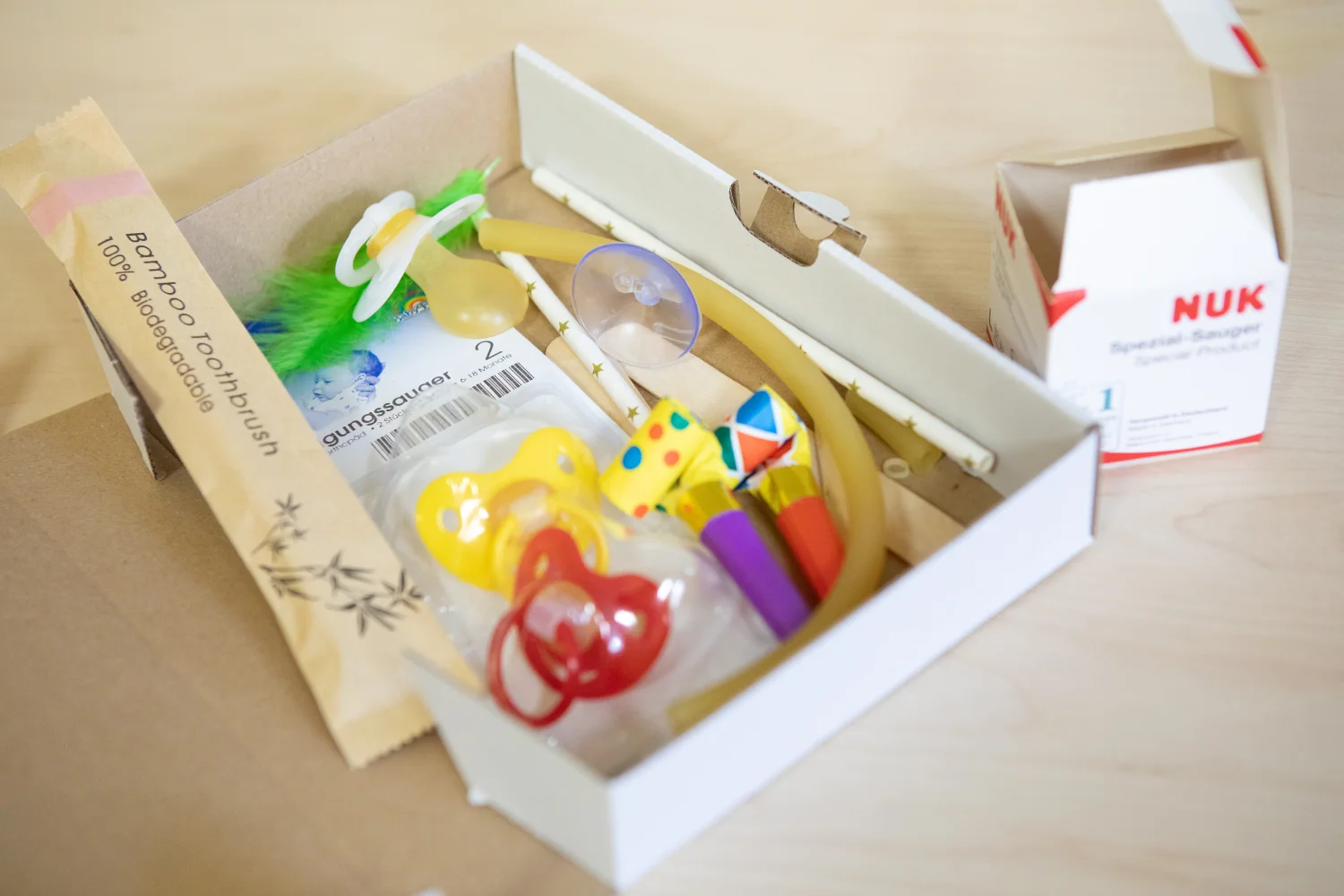 NF!T®, Kinderartikel in einer Box